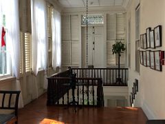 15B Stairs lead down from the upper vestibule to the entrance vestibule Devon House mansion Kingston Jamaica